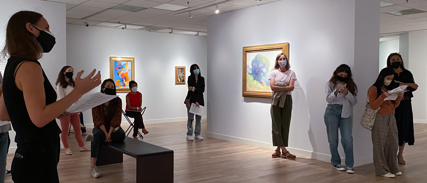 IMG_9679-2 image of a curator speaking with some visitors