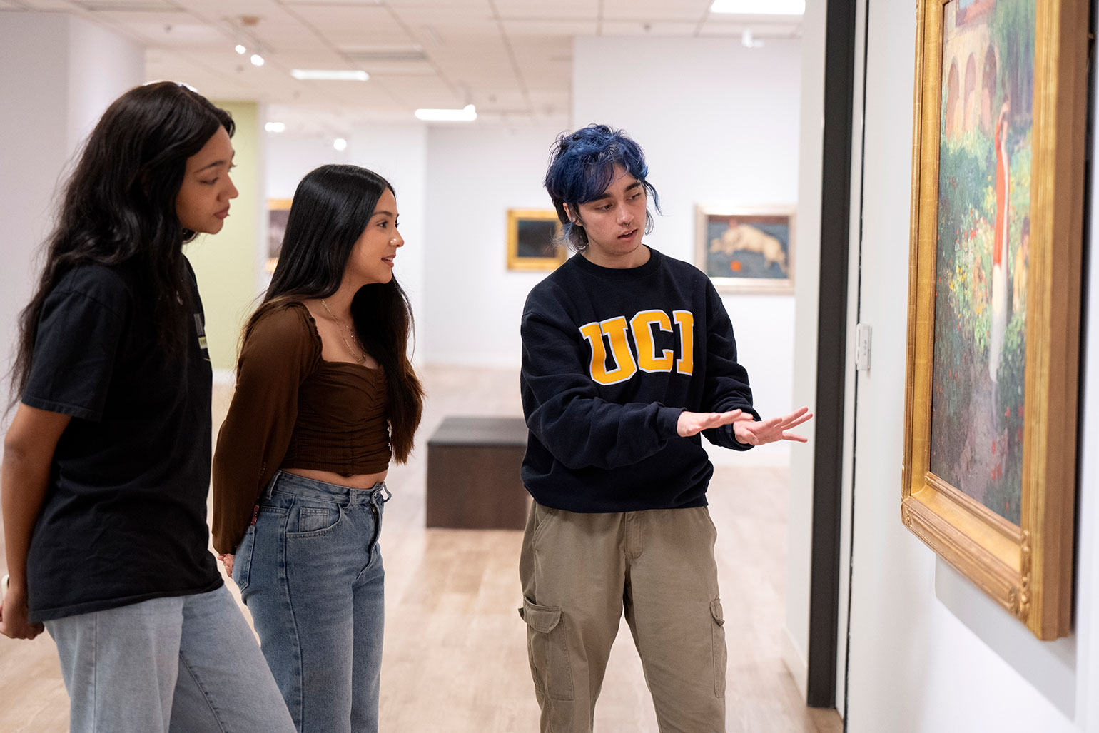 IMCA docent explains artwork to visitors