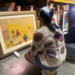 Lourdes Enriquez and Jewel Loya get a closer look at works for their In Focus Gallery Presentation
